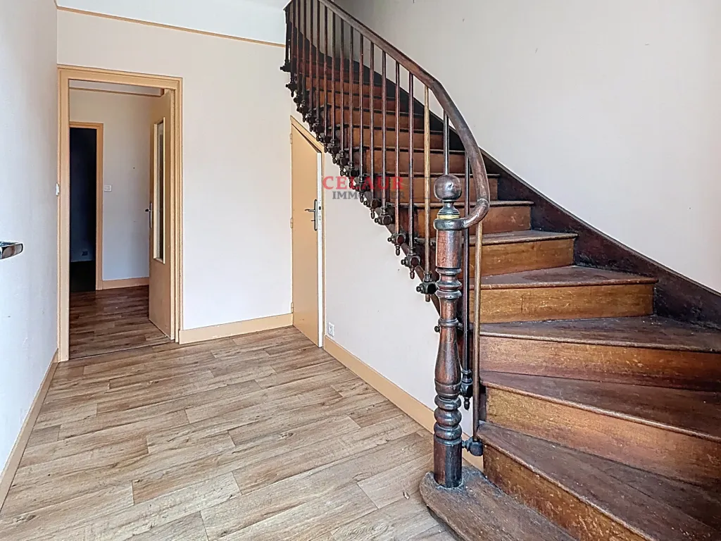 Maison mitoyenne en plein centre